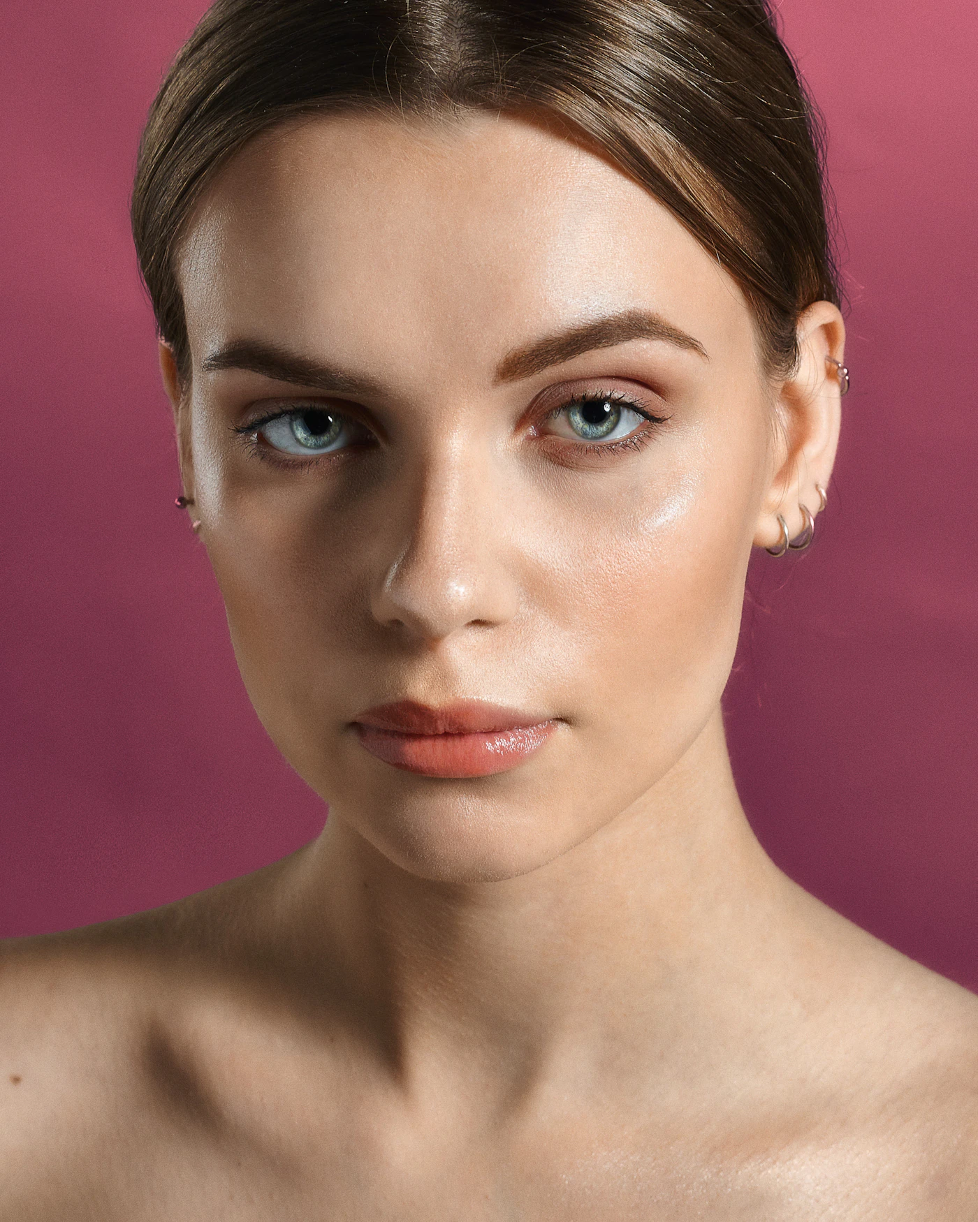 Portrait of a woman wearing delicate earrings