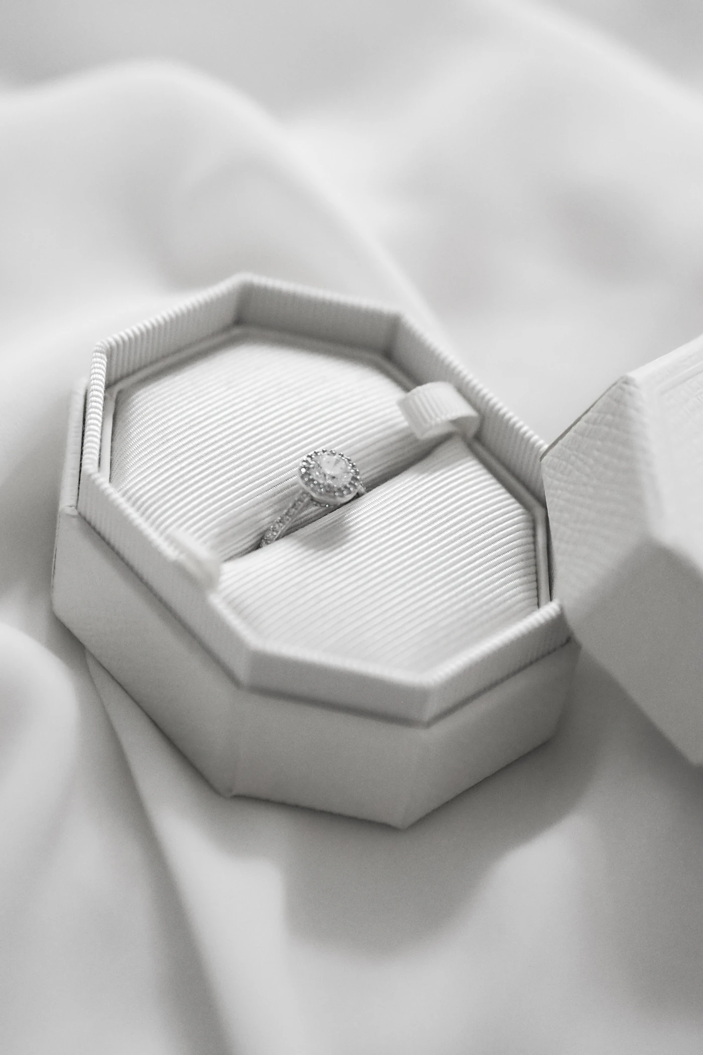 Ring presented in an open white gift box
